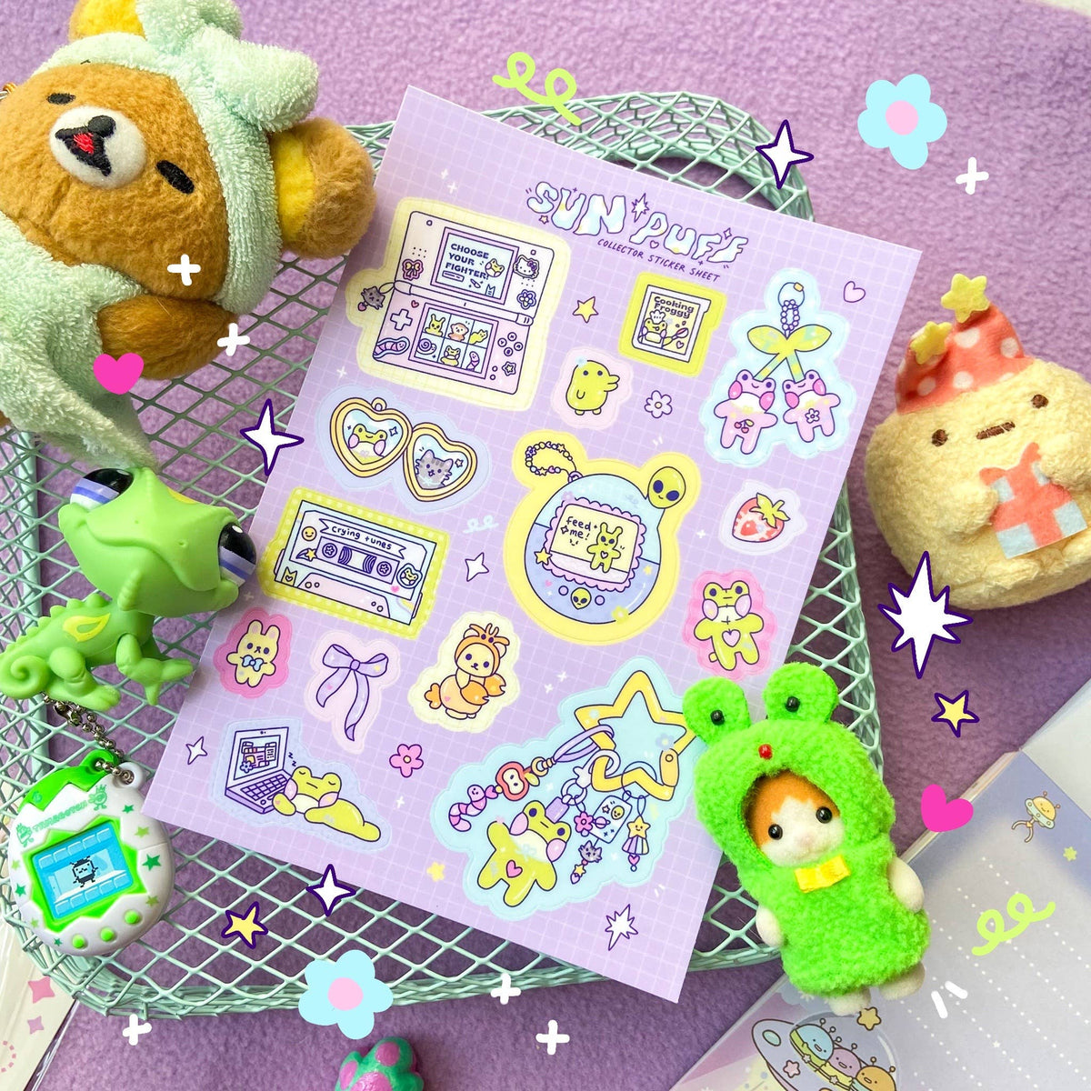 Pastel purple sticker sheet with cute animal figures, hearts, stars, and swirls