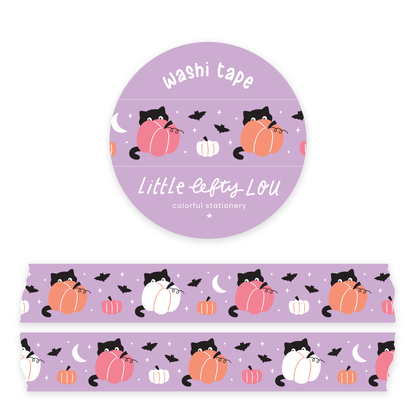 Purple washi tape with sneaky cats, pumpkins, bats, moons, and skull icons