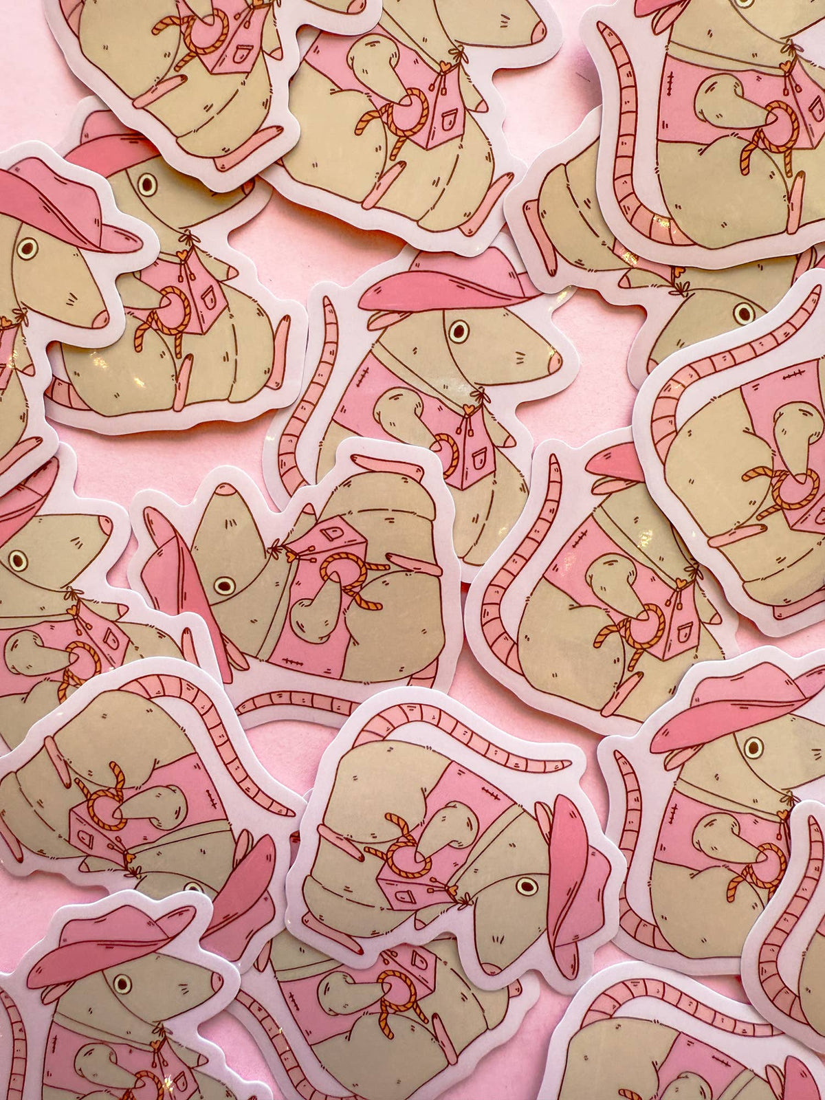 Cowboy rat vinyl sticker sheet, close view of tan rats with pink hats and red accents