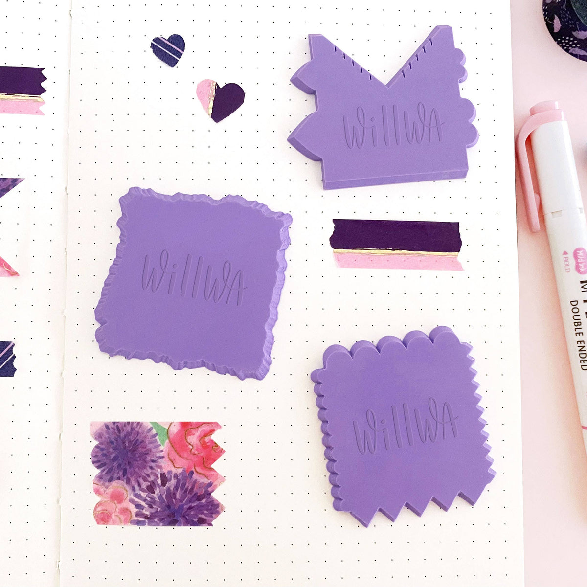 Purple washi cutter pieces: house-shaped and square die-cut forms on dotted paper
