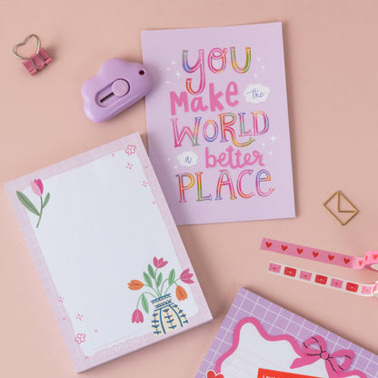 Purple postcard featuring colorful text: 'You make the world a better place'
