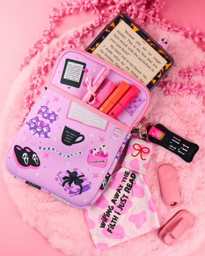 Lavender book sleeve with zipper, cartoon icons, and e-reader inside