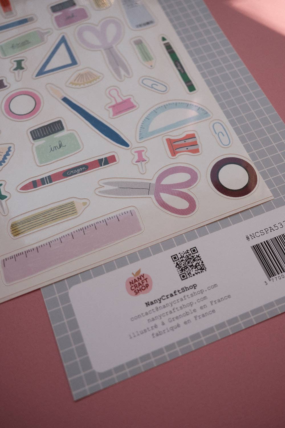 A5 sticker sheet with stationery stickers, plus barcode and label on backing card