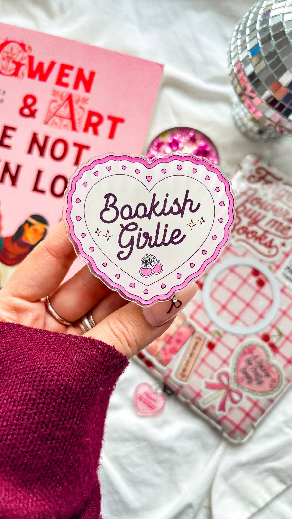 Heart-shaped pink Bookish Girlie magnetic grip with sparkly center