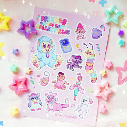 Pink vinyl sticker sheet with multiple animal character stickers, hearts, and sparkle stars