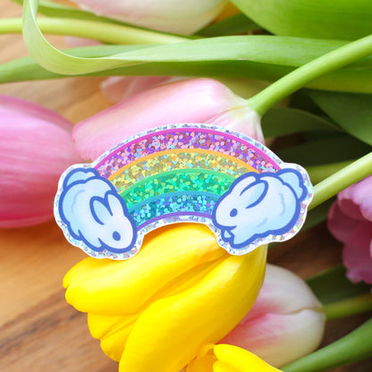 Rainbow bunny glitter sticker with arched rainbow and blue bunny head accents
