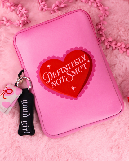 Definitely Not Smut e-reader sleeve, pink, zip-top with heart logo and keychain