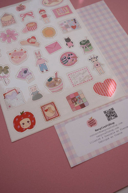 Sticker sheet with character icons, hearts, envelopes, plus a backing card with QR code