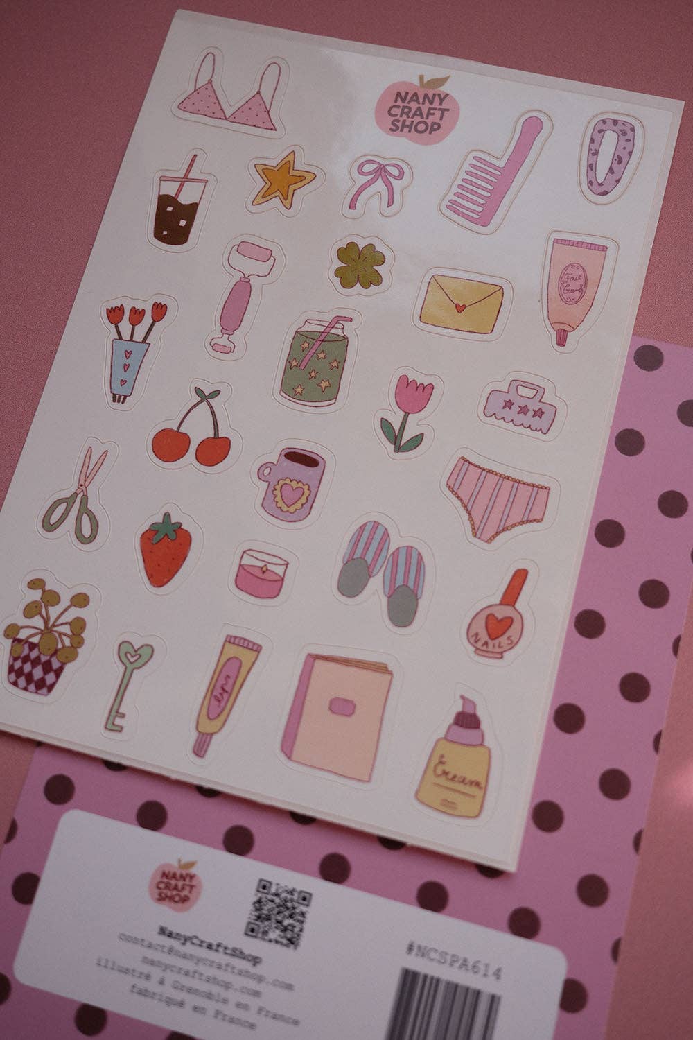 Sticker sheet featuring girly icons: dresses, heels, cherries, envelopes, flowers, and hearts