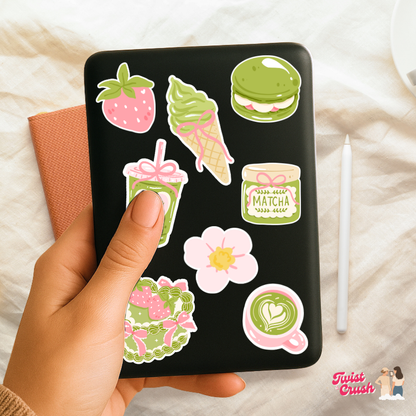 Set of strawberry and food-themed vinyl stickers on a black phone case
