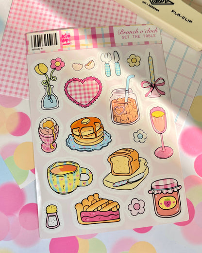 Brunch o'clock sticker sheet featuring food and drink icons: toast, cake, goblets, utensils.