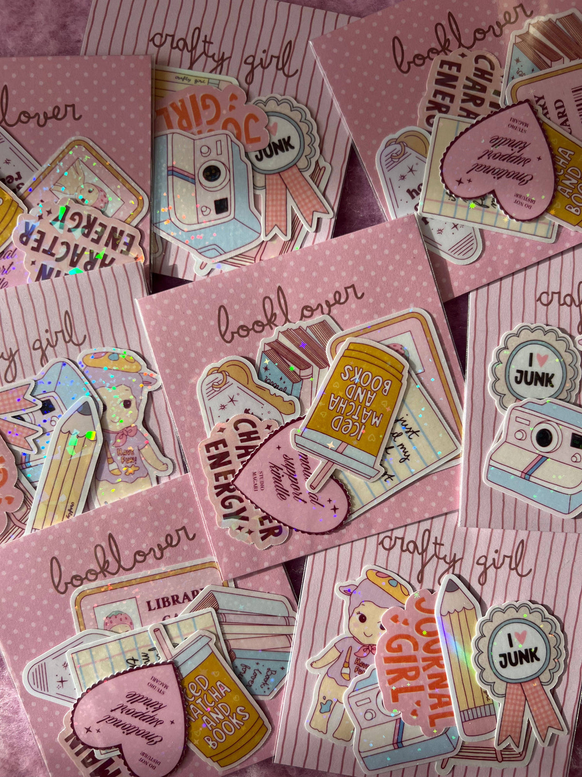 Crafty girl sticker pack with multiple camera and book-themed stickers plus round 'JUNK' badges