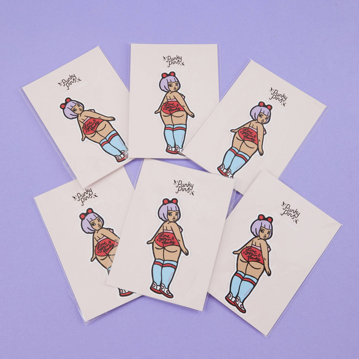 Set of five cartoon vinyl stickers showing a stylized woman in a red top and blue pants