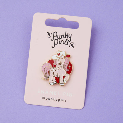 Cowgirl pony enamel pin on Punky Pins card, white unicorn with red cowboy hat and hearts