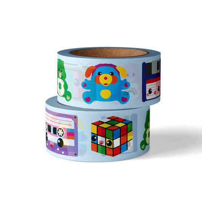 Washi tape roll with colorful pop icons on a light background