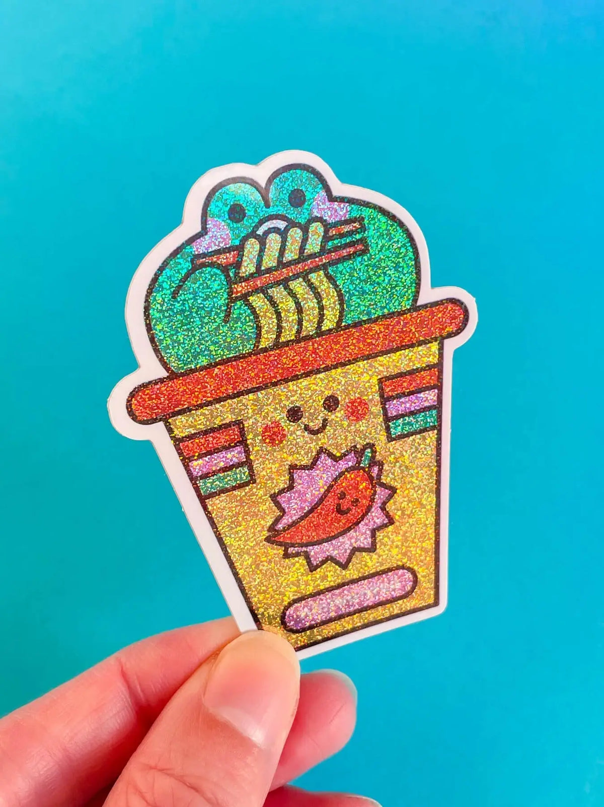 Vinyl sticker featuring a smiling cartoon toaster with noodles on top