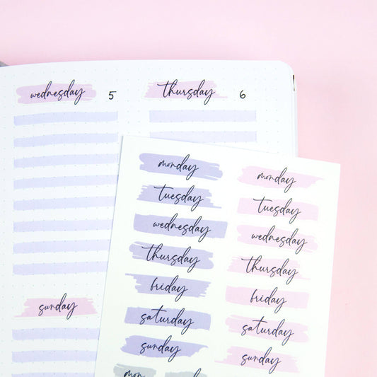 Sticker sheet with pastel day-name labels in columns, including Wednesday and Thursday.
