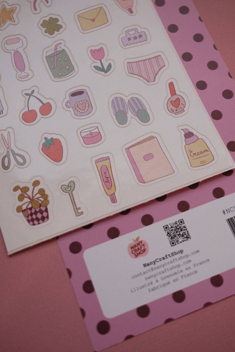 Sticker sheet featuring girly icons with rounded layout; includes tulips, envelopes, cherries