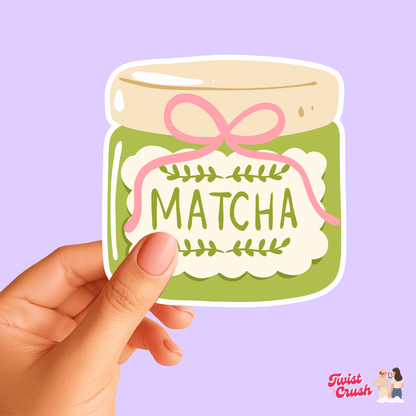 Matcha jar sticker with green jar, pink bow, and 'MATCHA' label