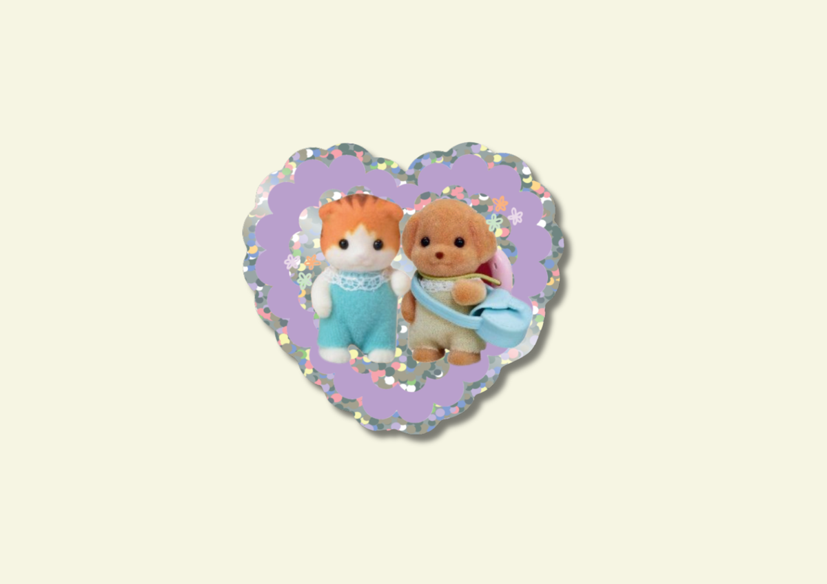 Glitter vinyl heart sticker with two teddy bear friends in pastel outfits