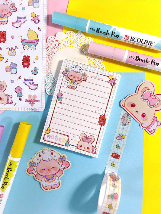 Pastel notepad with lined pages and cute cartoon sheep, hearts, and bows
