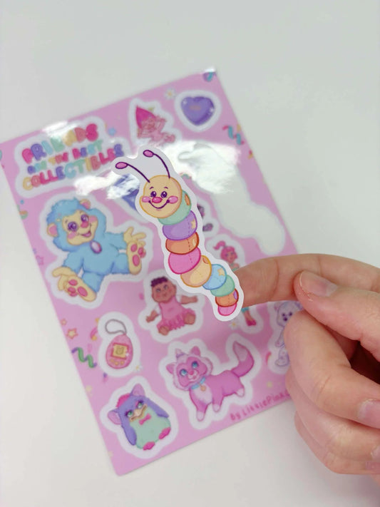 Pink vinyl sticker sheet with cute cartoon characters, hearts, and bunny designs