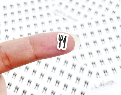 Mini fork icon sticker, black fork with white outline on fingertip