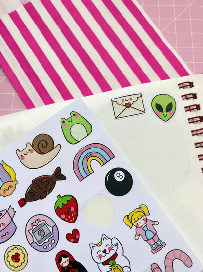 Deco sticker sheet with avocado alien, rainbow, cat, mail icons, and girl figure