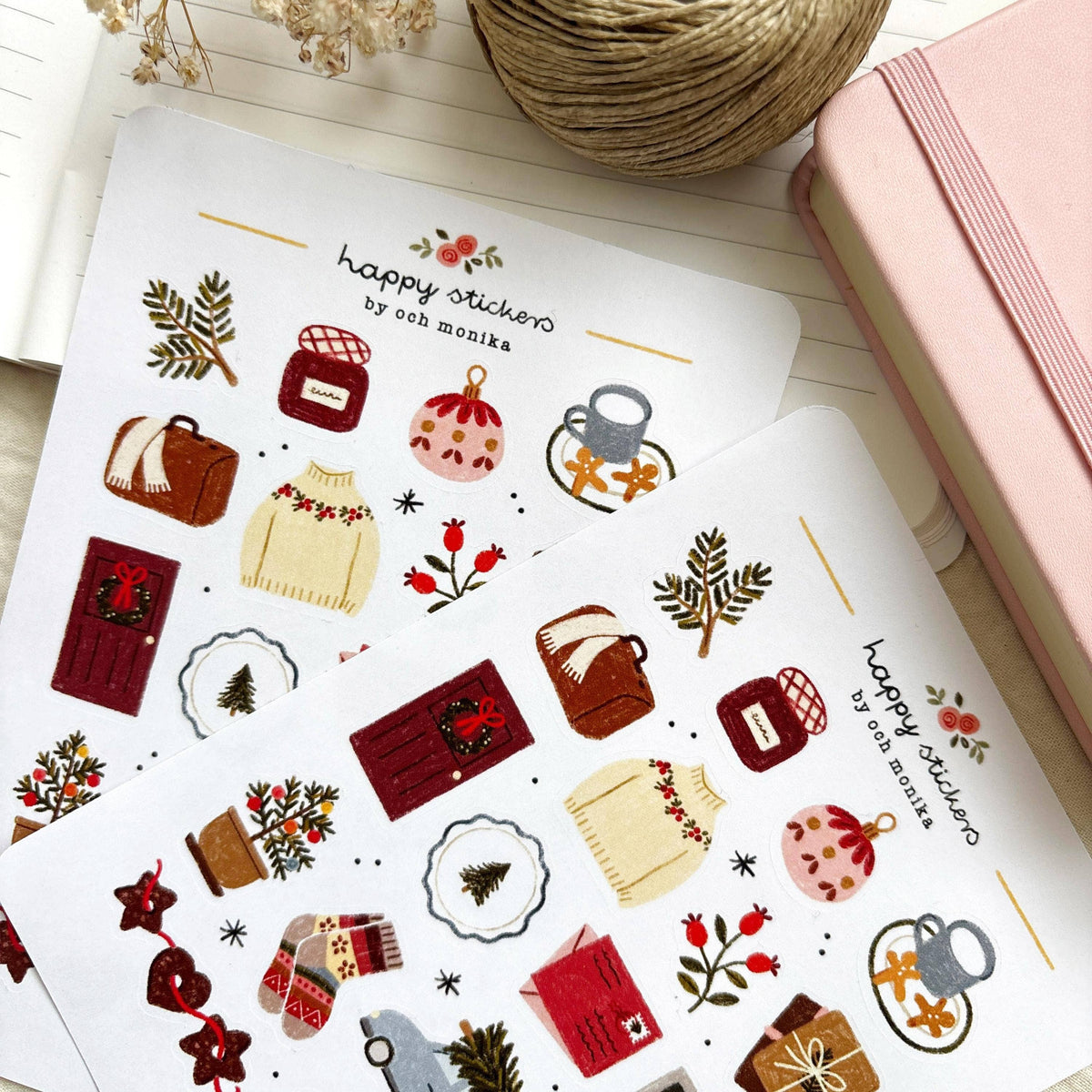 Winter sticker sheet with sweater, mug, holly sprig, gift icons, and a festive sign.