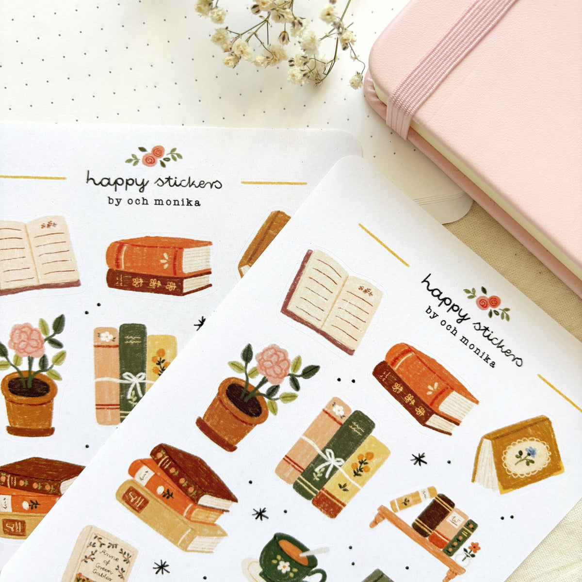 Bookish sticker sheet close-up with books, teapot, and stacked volumes
