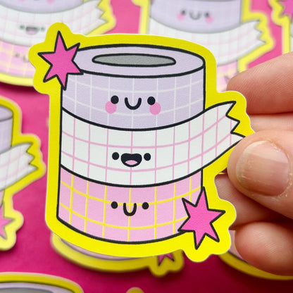 Cartoon vinyl sticker: smiling stacked cups with grid pattern and yellow stars