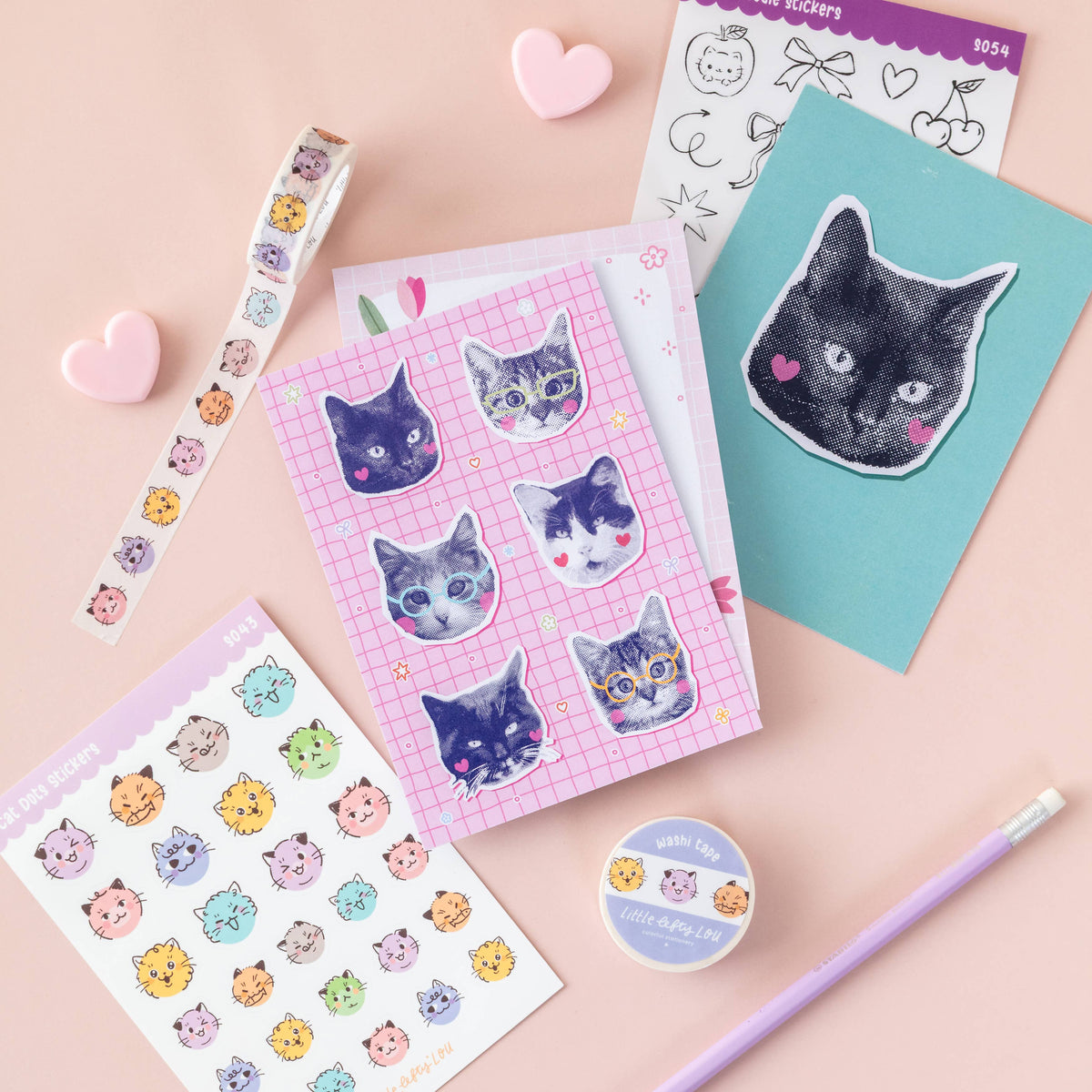 Cat sticker sheets set, featuring dot-style cat faces and one large cat head sticker