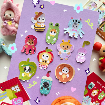 Purple sticker sheet with assorted costume animal and character stickers, including hats