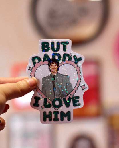 Heart-shaped holographic sticker with man portrait and message BUT DADDY LOVE HIM