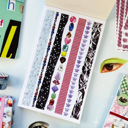 Decorative sticker strip sheet with stars, hearts, and colorful hanging charm designs