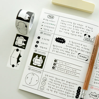 Cat memo tape roll with white tape and black cat illustrations, plus notes sheet
