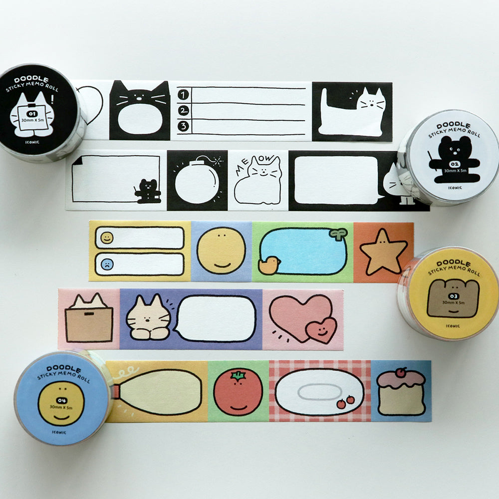 Cat memo tape set with colorful tape strips and cat face designs, on a tray