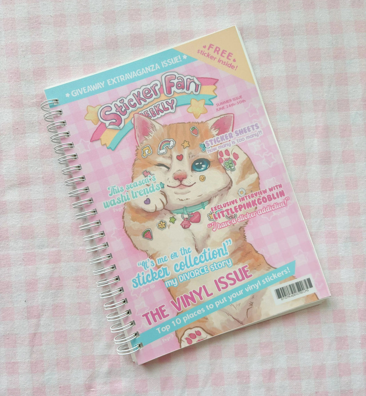 Pink cat-themed reusable sticker book with spiral binding and sticker issue cover