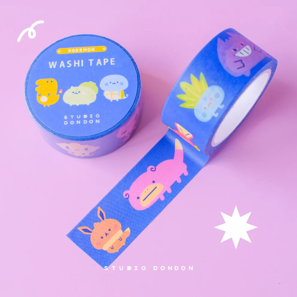Blue washi tape with cartoon creatures, roll and ribbon strip